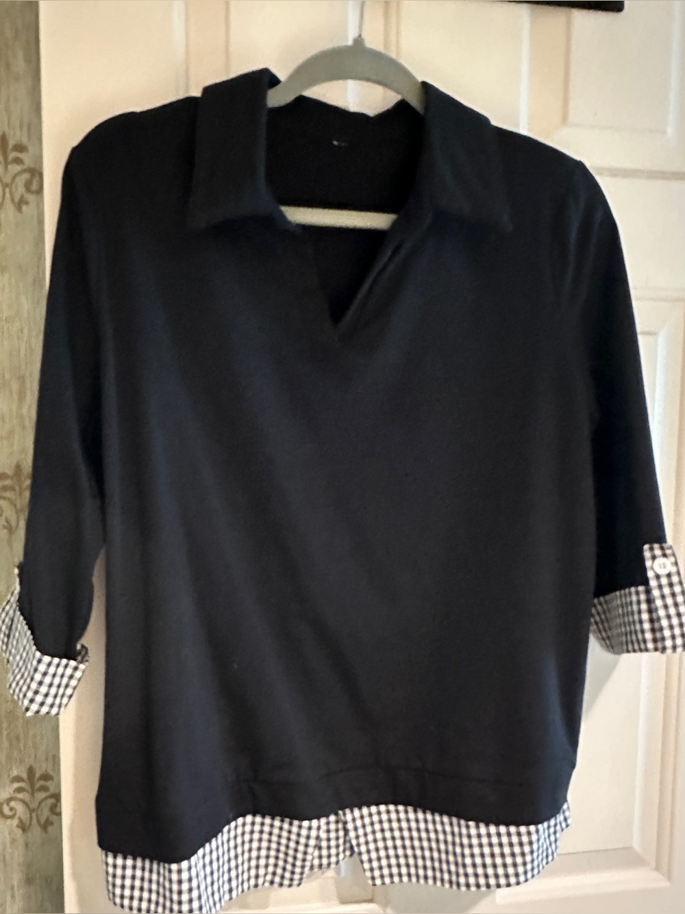 Never worn, black, light sweatshirt material, with b/w gingham hem and cuffs